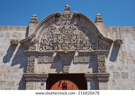 Ornate stone carved entrance to the 18th century baroque style Spanish colonial house in Arequipa, Peru