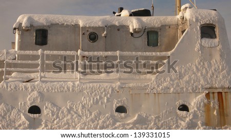 Boat cabin covered with snow