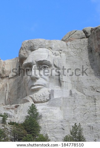 Lincoln at Rushmore The famous face of President Abraham Lincoln, the sixty foot face is carved in granite.