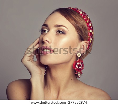 Woman  With The Hoop And Stylish Earrings
