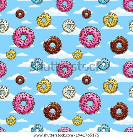 Donuts with pink glaze and colored sprinkles  on blue sky background.  Seamless pattern. Texture for fabric, wrapping, wallpaper. Decorative print.