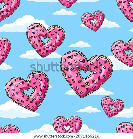 Donuts hearts with pink glaze and colored sprinkles  on blue sky background.  Seamless pattern. Texture for fabric, wrapping, wallpaper. Decorative print.