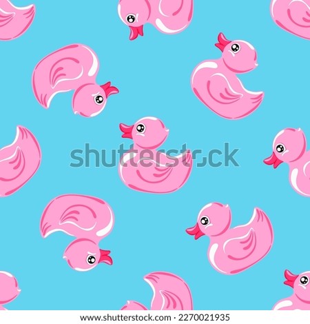 pink rubber ducks on blue background.  Seamless pattern. Texture for fabric, wrapping, wallpaper. Decorative print.Vector illustration