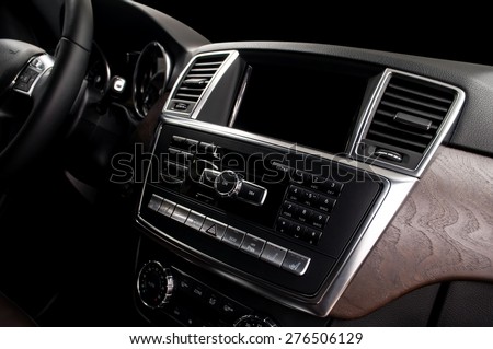 Modern car dashboard. Screen multimedia. Interior detail.