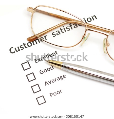 customer satisfaction survey form with the pen and eye glasses