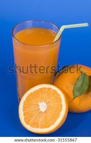 Fresh orange food and juice  over blue background
