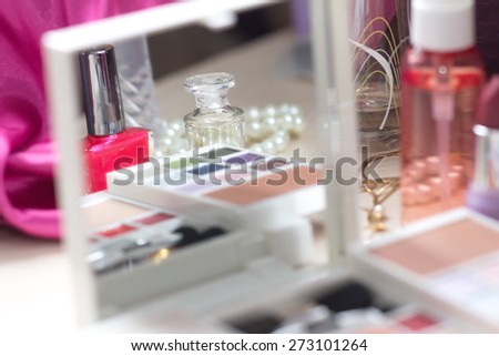 Different cosmetic products for beautiful woman