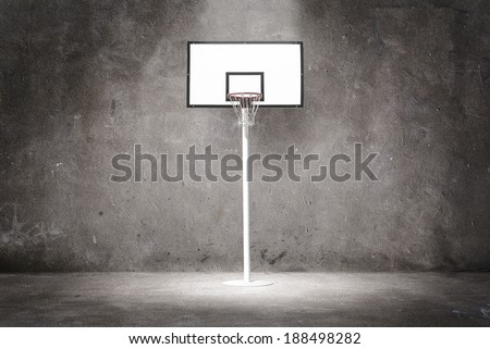 Basketball hoop on a textured wall