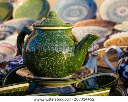 Green ceramic teapot in Bukhara, Uzbekistan