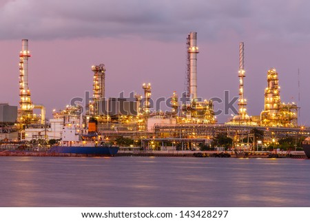 twilight oil refinery and port big boat transport