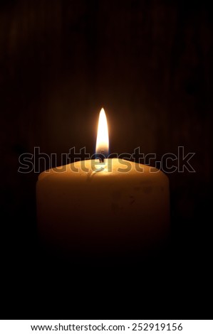 Candle in the dark (also space for text)