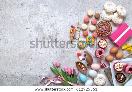Assorted easter sweets, bakery cupcakes, chocolate eggs and confectionery with space  Foto stock © 