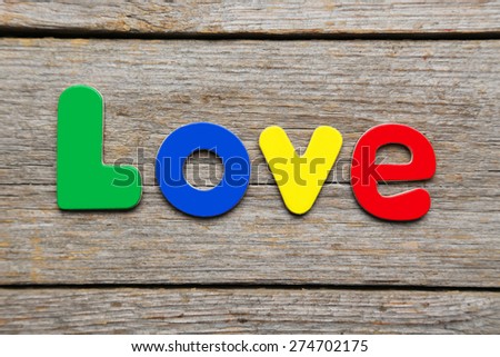 Love word made of colorful magnets