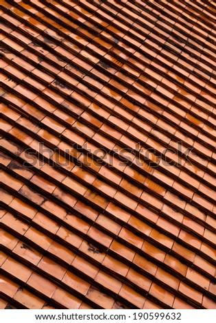 Old roof tiles made of terracotta texture.