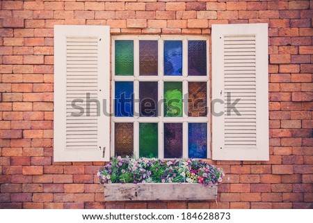 Retro white window on brick wallpaper
