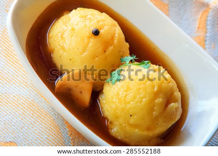 Mashed potato with gravy poured over