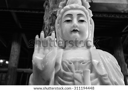 black and white buddha sculpture