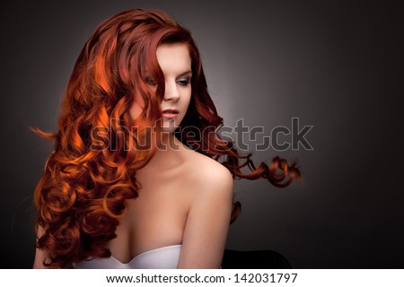 Glamour woman with long red