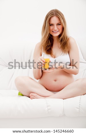 Pregnant woman with juice