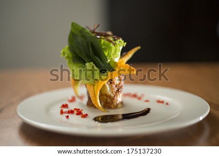 Modern deli artistic salad gourmet in fancy restaurant centered wooden table