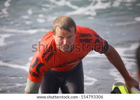 SAN CLEMENTE, CALIFORNIA - SEPT 15: Pro surfer and contest champion Taj Burrow at the Hurley Pro 2013 at Lower Trestles in San Clemente, California.