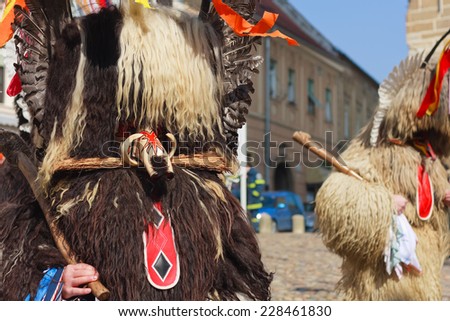 Slovene old traditional carnival mask, chasing away winter, calling spring, running and dancing on the streets of Ptuj, Slovenia
