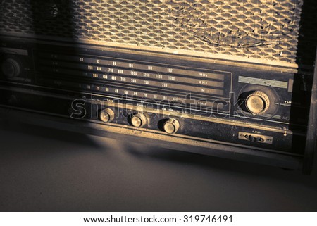 Close up of old radio, retro cross processed colors.