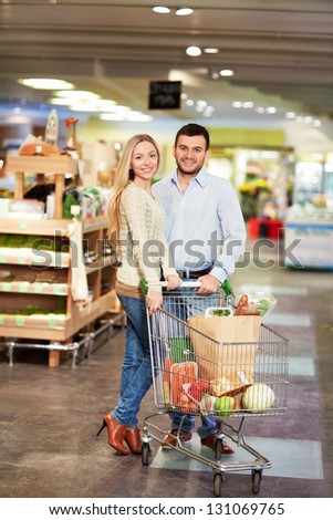 Young couple buying products in the store