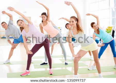 Active young people in fitness club