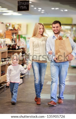 Family with child in a store