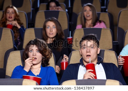 People watching movie at the cinema