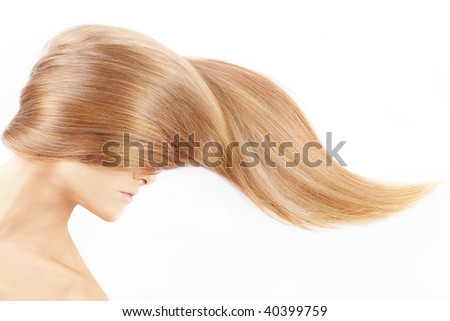 The female head closed by a fair hair, isolated