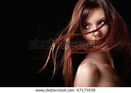 A pretty young girl with flowing hair