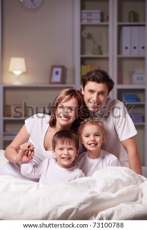 Parents with children at home in the evening