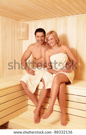 Young couple in sauna