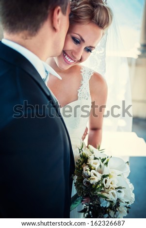 Young happy bride and groom