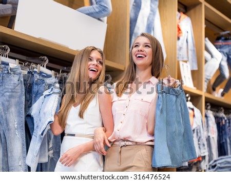 Laughing girl in the store