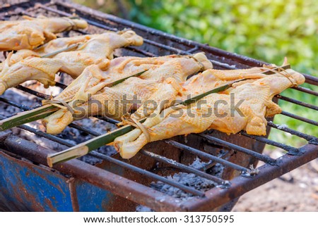 Grill of Chicken on stove Thai food.
