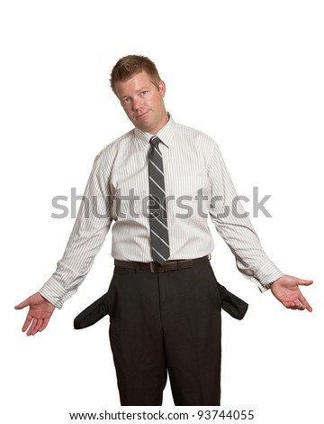 Handsome man in suit broke with empty pockets on white