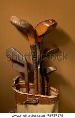 Set of old vintage golf clubs in bag