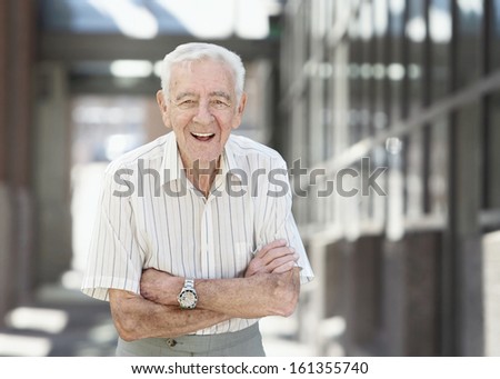 Elderly 90 year old man laughing healthy businessman