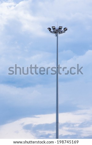 modern light pole with blue sky