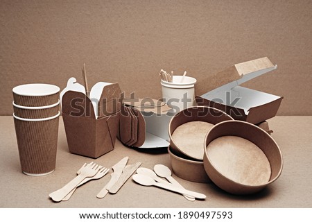 A set of paper and wood, environmentally friendly and biodegradable disposable tableware. Fast food, cafe