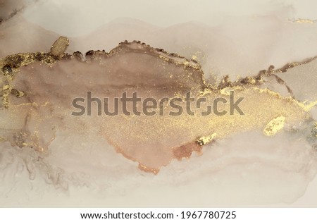 Art Abstract  watercolor and acrylic marble flow blot painting. Brown and gold Color canvas marble texture background. Alcohol ink.