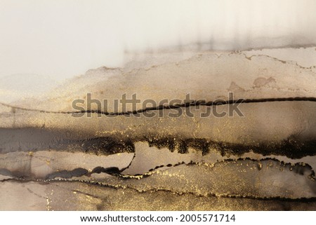 Art Abstract  watercolor marble flow blot painting. Black and gold Color canvas texture horizontal background. Alcohol ink.