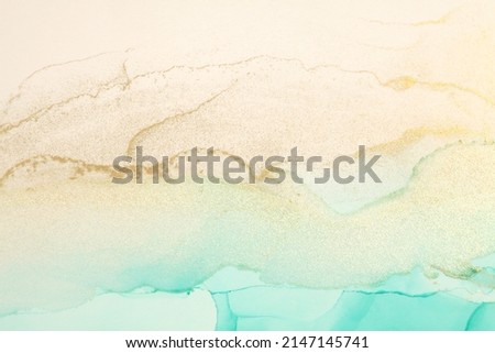 Art grain,Abstract watercolor marble smoke blot painting. Beige and gold Color canvas texture horizontal background. Alcohol ink.