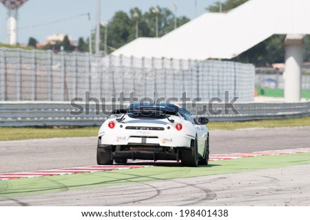 MISANO ADRIATICO, Rimini, ITALY - May 10:  A Lotus Evora GT4 of Lechner Racing School team, driven By LAUDA Fabian (AUT),  the GT4 European Series car racing on May 10, 2014 in Misano Adriatico.