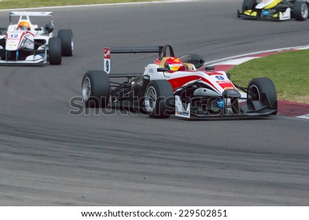 Imola, Italy - October 11, 2014: Dallara F312 -Mercedes of Fortec Motorsport Team, driven by Cao Hongwei (Chn) in action during the Fia Formula 3 European