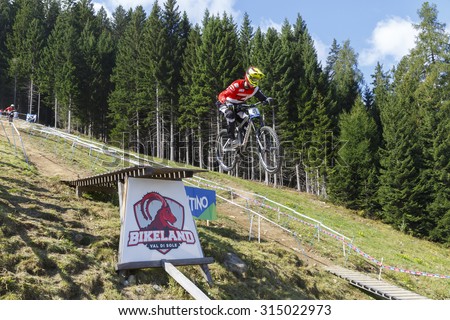 Val Di Sole, Italy - 22 August 2015: Ghost Rrp Team,  Rider Trummer David, in action during the mens elite Downhill final World Cup at the Uci Mountain Bike in Val di Sole, Trento, Italy