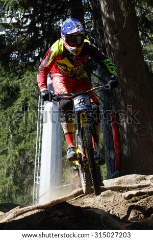 Val Di Sole, Italy - 22 August 2015: Devinci Global Racing Team rider Smith Steve, in action during the mens elite Downhill final World Cup at the Uci Mountain Bike in Val di Sole, Trento, Italy